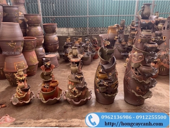 Thác nước phong thủy tiểu cảnh với cây xanh